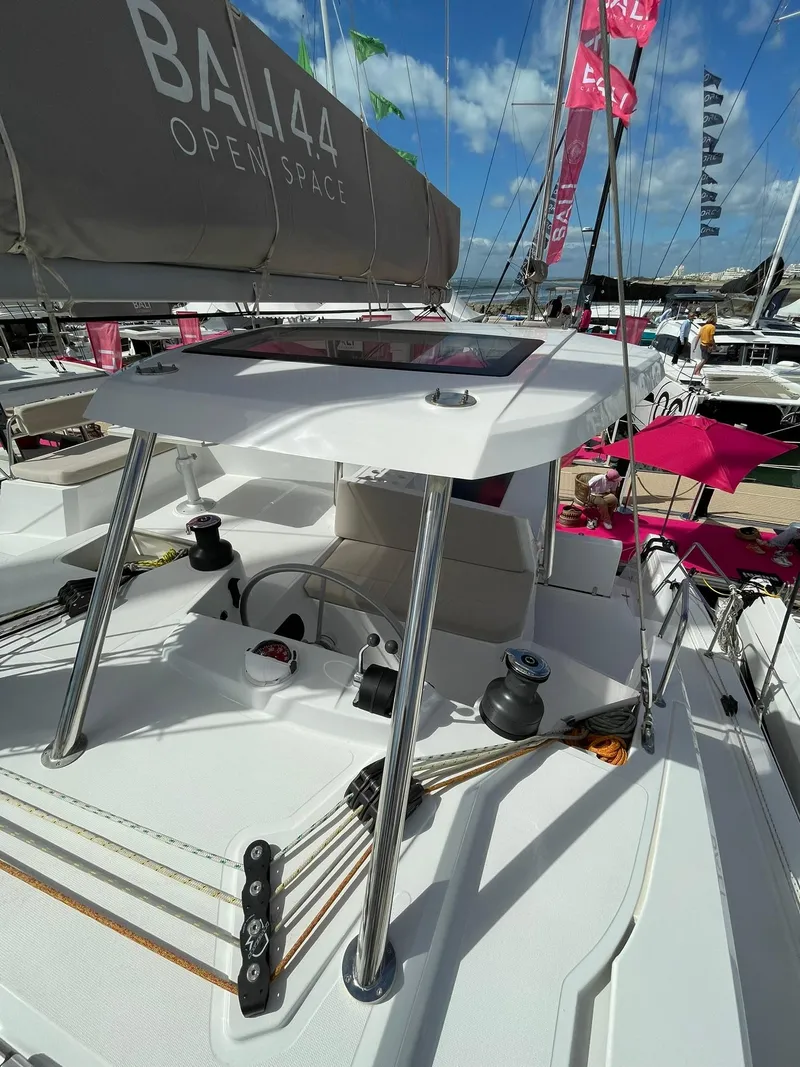 Slide: The Image of 2026 Bali 4.4 yacht deck with open space design, featuring modern sailing equipment. - 28