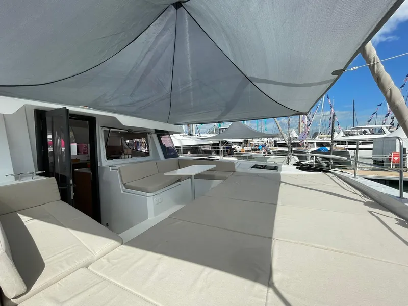 Slide: The Image of Luxurious Bali 4.4 catamaran deck with sunshade, spacious seating, and modern design, 2026 model. - 33