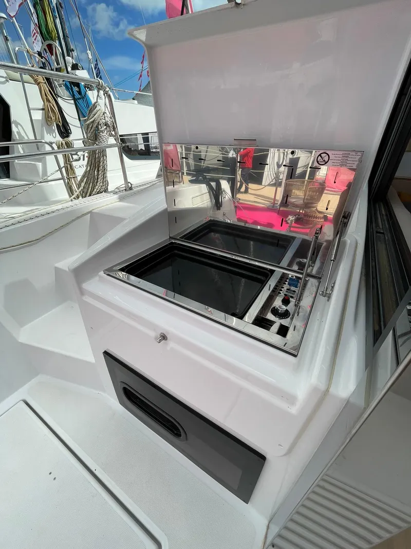 Slide: The Image of Outdoor kitchen on a 2026 Bali 4.4 yacht with stainless steel grill. - 40