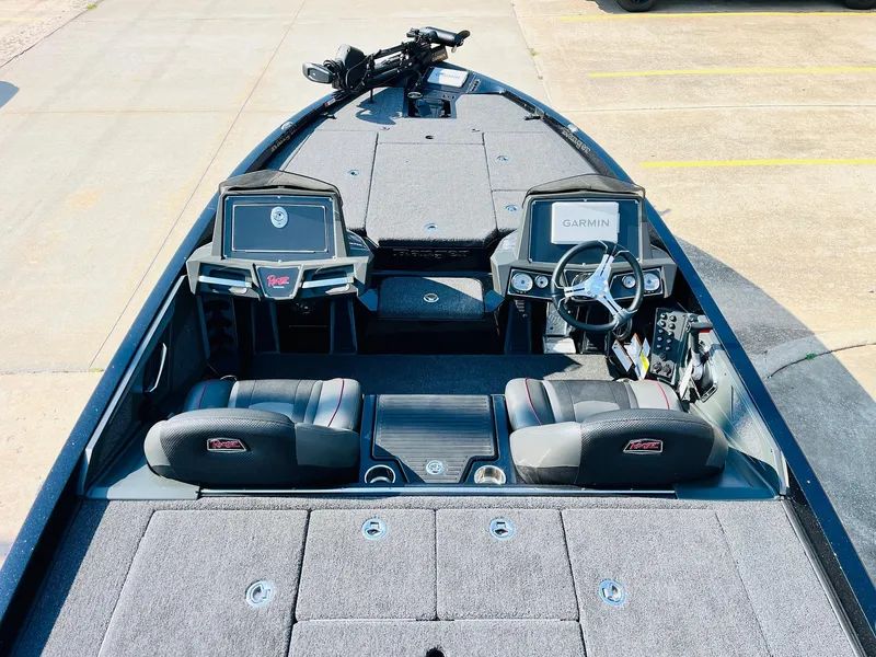 Slide: The Image of 2025 Ranger Z518 Cup-Equipped boat interior with dual screens and steering wheel. - 11