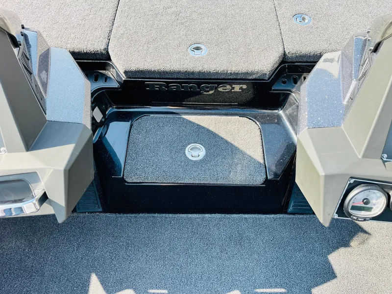 Slide: The Image of 2025 Ranger Z518 Cup-Equipped boat deck with storage compartments and sleek design. - 27