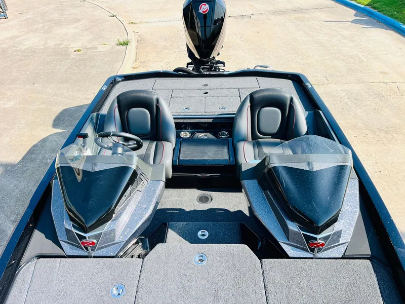 Slide: The Image of 2025 Ranger Z518 Cup-Equipped boat interior with dual seats and steering wheel. - 30