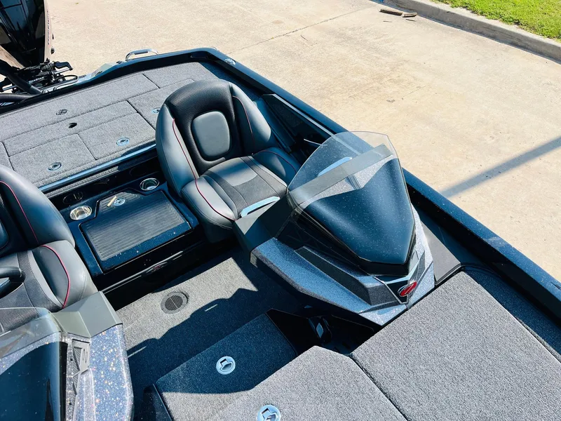 Slide: The Image of 2025 Ranger Z518 Cup-Equipped boat interior with sleek seating and storage compartments. - 31