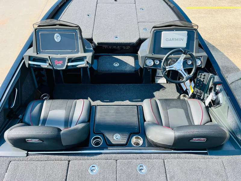 Slide: The Image of 2025 Ranger Z518 Cup-Equipped boat interior with dual seats and Garmin navigation system. - 32