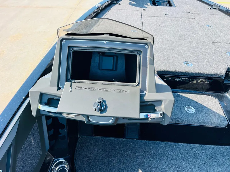 Slide: The Image of 2025 Ranger Z518 Cup-Equipped boat interior with storage compartment open. - 33