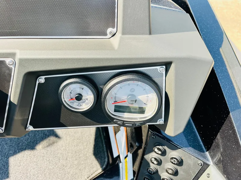Slide: The Image of Dashboard of 2025 Ranger Z518 Cup-Equipped boat with gauges and controls. - 39