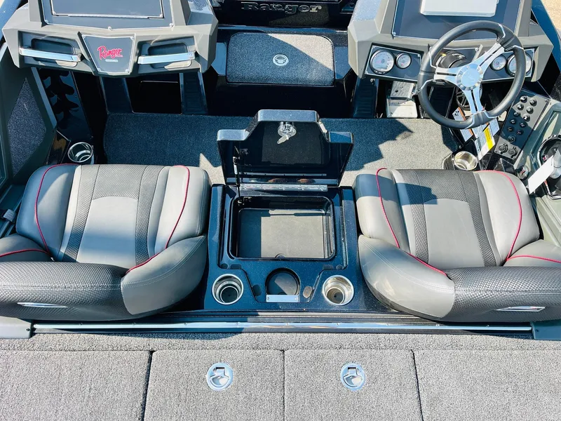 Slide: The Image of 2025 Ranger Z518 Cup-Equipped boat interior with dual seats and steering console. - 42