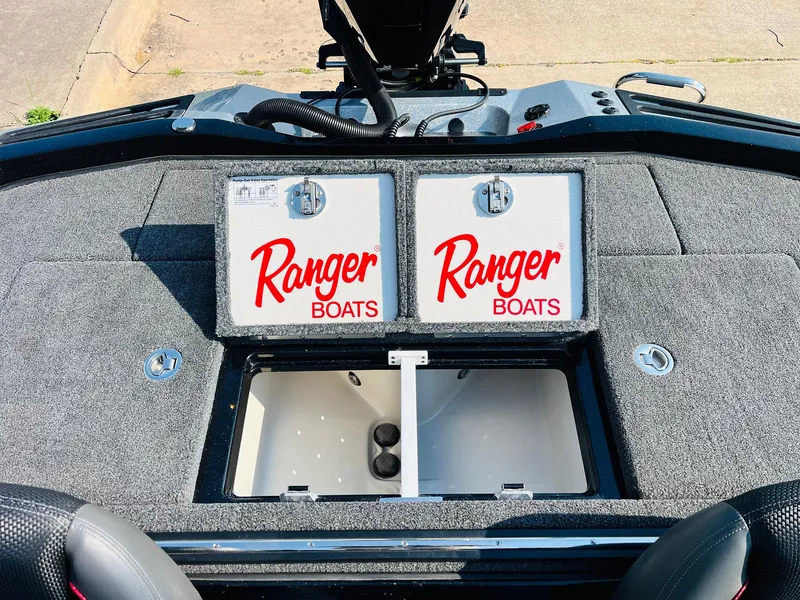 Slide: The Image of 2025 Ranger Z518 Cup-Equipped boat interior with storage compartments open. - 45
