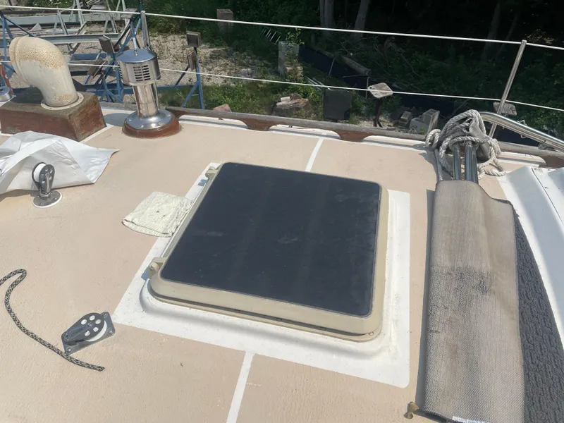 Slide: The Image of Deck of 1980 Cape Dory 36 sailboat with hatch and equipment. - 13