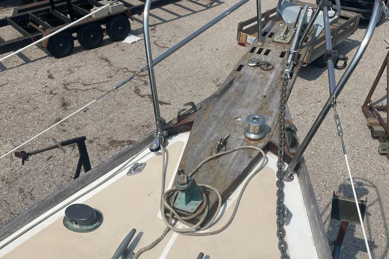 Slide: The Image of Bow of 1980 Cape Dory 36 sailboat with anchor chain and deck fittings. - 14