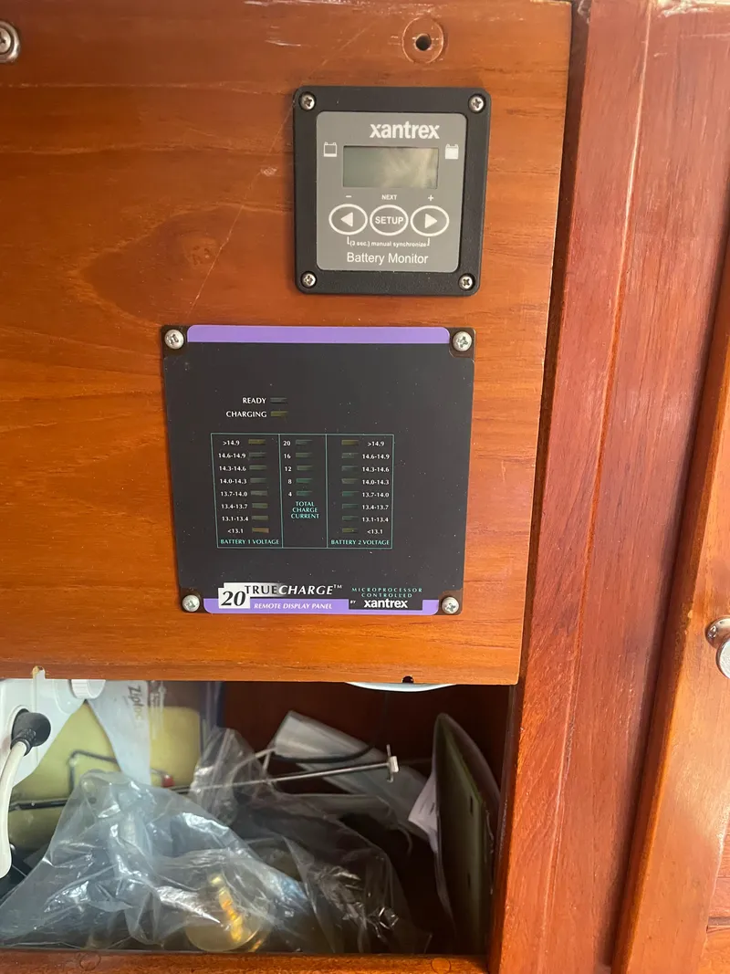 Slide: The Image of Battery monitor and charger panel on 1980 Cape Dory 36 sailboat. - 32