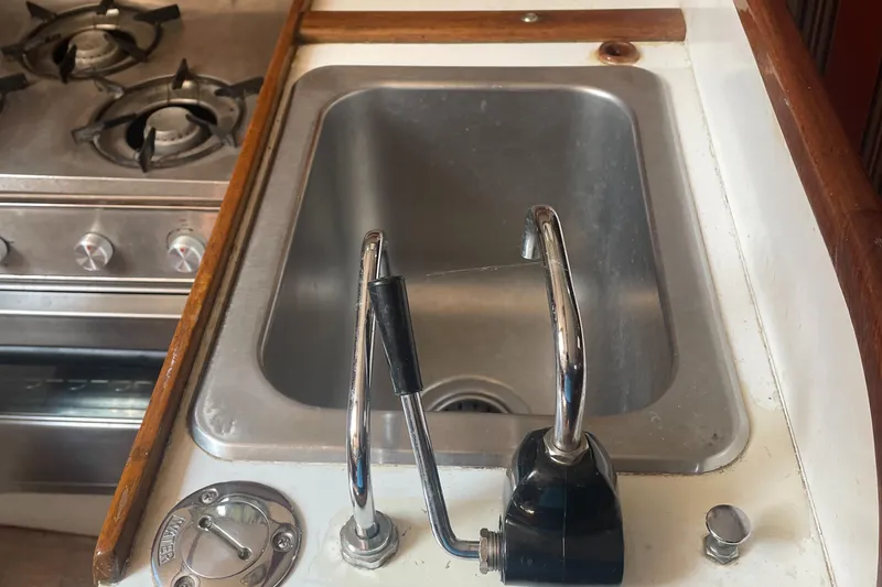 Slide: The Image of Galley sink and stove in 1980 Cape Dory 36 yacht kitchen. - 40