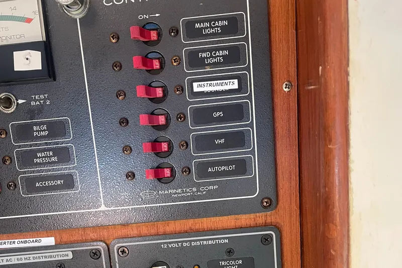 Slide: The Image of Control panel of a 1980 Cape Dory 36 sailboat with switches and labels. - 47