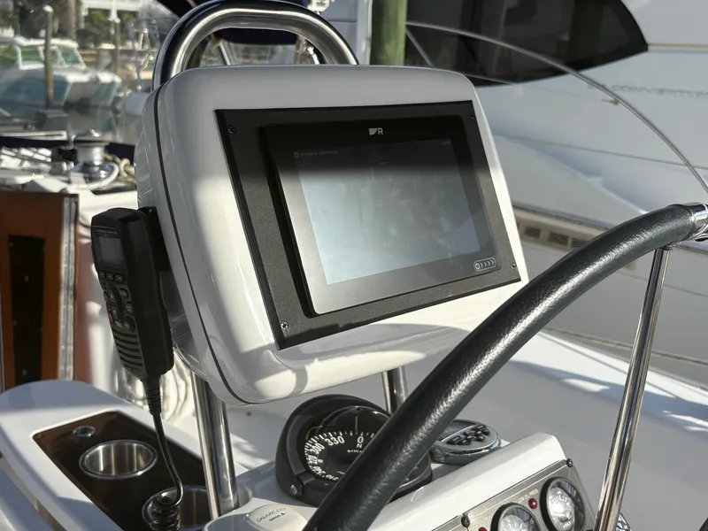 Slide: The Image of Helm of 2011 Catalina 355 sailboat with navigation equipment and steering wheel. - 18