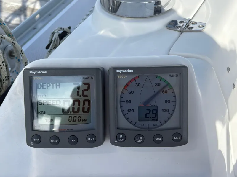Slide: The Image of Raymarine instruments on a 2011 Catalina 355 sailboat displaying depth and wind speed. - 21