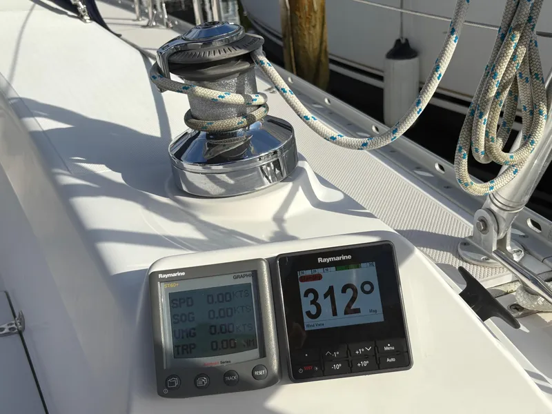 Slide: The Image of Sailing instruments on a 2011 Catalina 355 yacht, featuring Raymarine displays and winch. - 23
