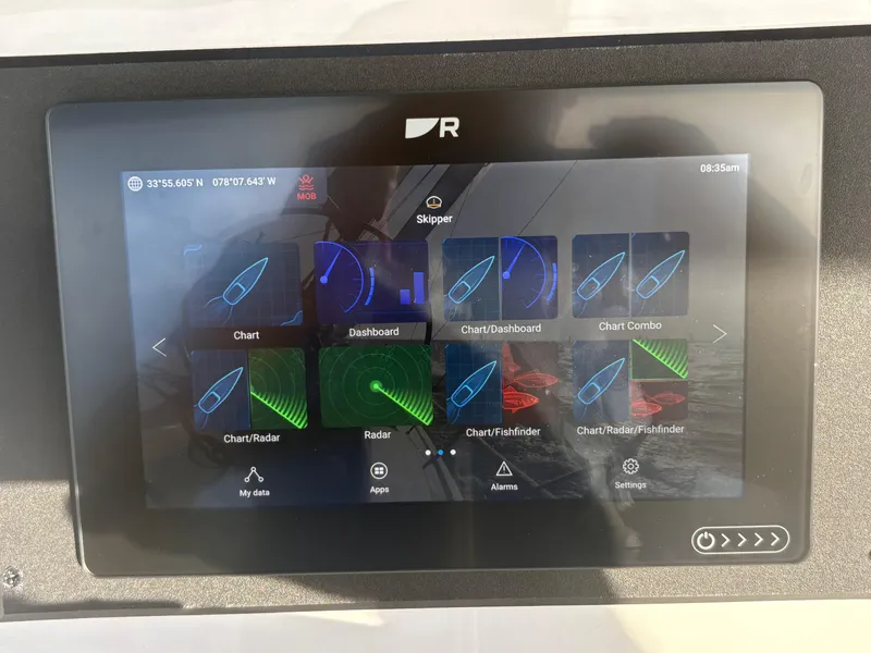 Slide: The Image of Touchscreen navigation display on a 2011 Catalina 355 sailboat, showing various chart and radar options. - 26