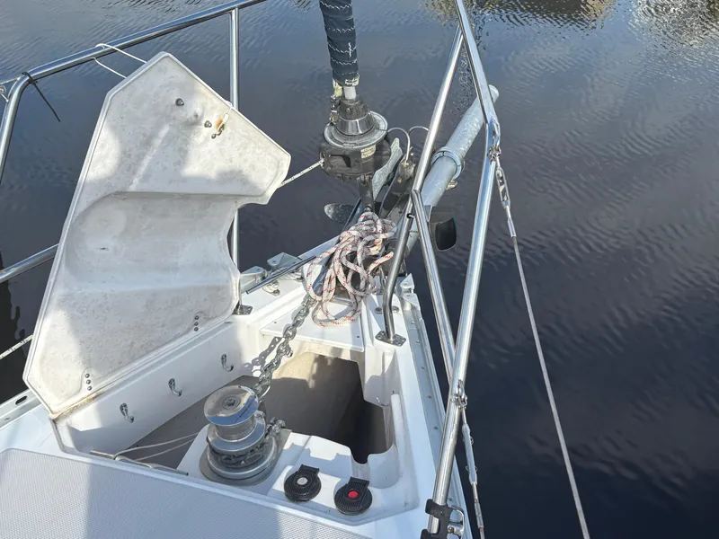 Slide: The Image of Bow of 2011 Catalina 355 sailboat with anchor chain and winch system. - 41