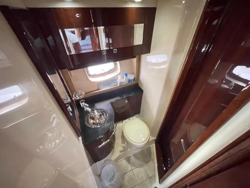 Slide: The Image of Luxurious bathroom interior of 2010 Sea Ray 450 Sundancer yacht with modern fixtures. - 23