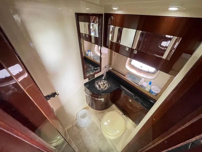 Slide: The Image of Luxurious bathroom interior of 2010 Sea Ray 450 Sundancer yacht with modern fixtures. - 24