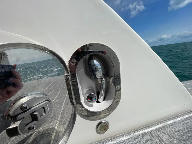 Slide: The Image of Luxurious interior of 2010 Sea Ray 450 Sundancer yacht with modern TV and ambient lighting. - 28