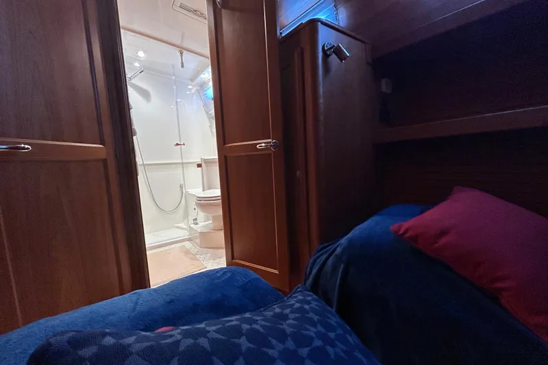 Slide: The Image of Luxurious cabin interior of 2022 Sabre 45 Salon Express yacht with cozy bedding. - 42
