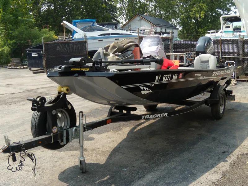The Image of 2018 Tracker Pro 160 boat on trailer in outdoor storage area. - 0