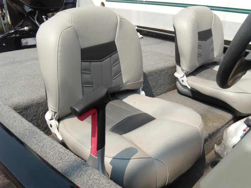 Slide: The Image of 2018 Tracker Pro 160 boat seats with gray upholstery and black accents. - 4