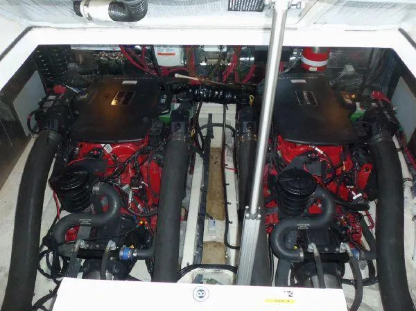 Slide: The Image of Engine compartment of 2009 Regal Commodore 4060 with dual engines and complex wiring. - 23