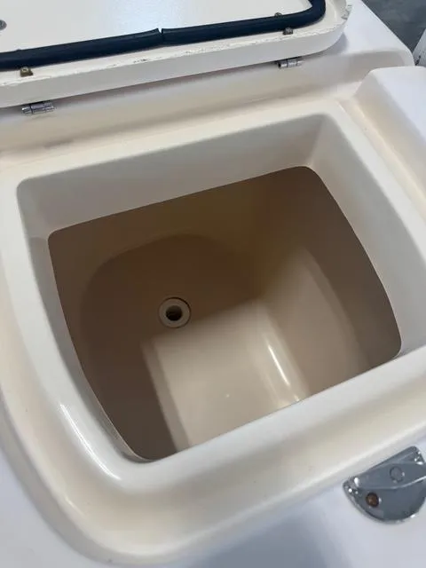 Slide: The Image of Livewell compartment on a 2011 Grady-White Freedom 275 boat. - 12