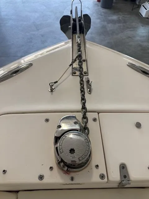 Slide: The Image of Bow of 2011 Grady-White Freedom 275 with anchor chain and winch. - 8