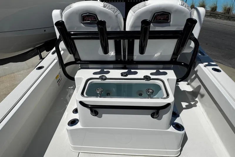 Slide: The Image of 2023 Ranger 2510 Bay boat interior with seating and livewell. - 17