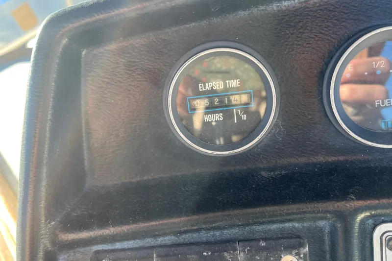 Slide: The Image of Elapsed time gauge on 1986 Carver 3607 Aft Cabin Motor Yacht dashboard. - 24
