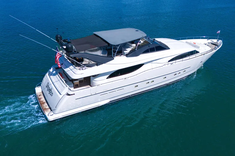 Slide: The Image of Luxurious 2002 Ferretti Yachts Custom Line 94 cruising on clear blue waters. - 14