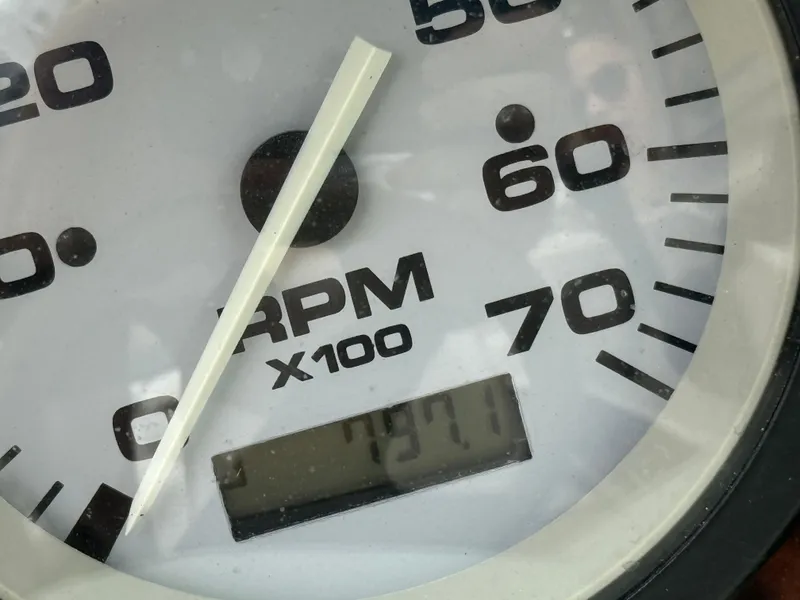 Slide: The Image of Close-up of a 2002 Sea Ray 176 Bow Rider RPM gauge displaying 797.1 hours. - 17