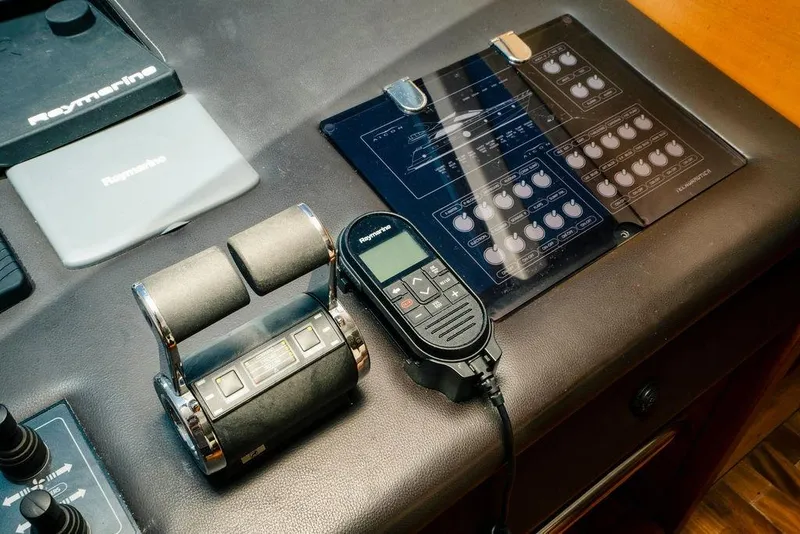 Slide: The Image of Control panel of a 2006 Aicon Flybridge yacht with Raymarine equipment. - 36