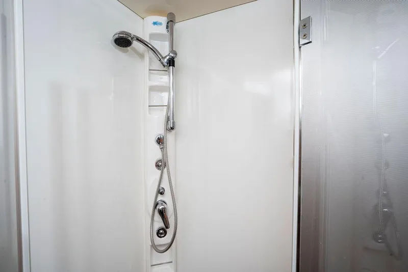 Slide: The Image of Shower area in 2006 Aicon Flybridge yacht, featuring modern fixtures and sleek design. - 89