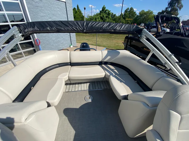 Slide: The Image of 2016 Manitou 25 Aurora pontoon boat with spacious seating and sleek design. - 18