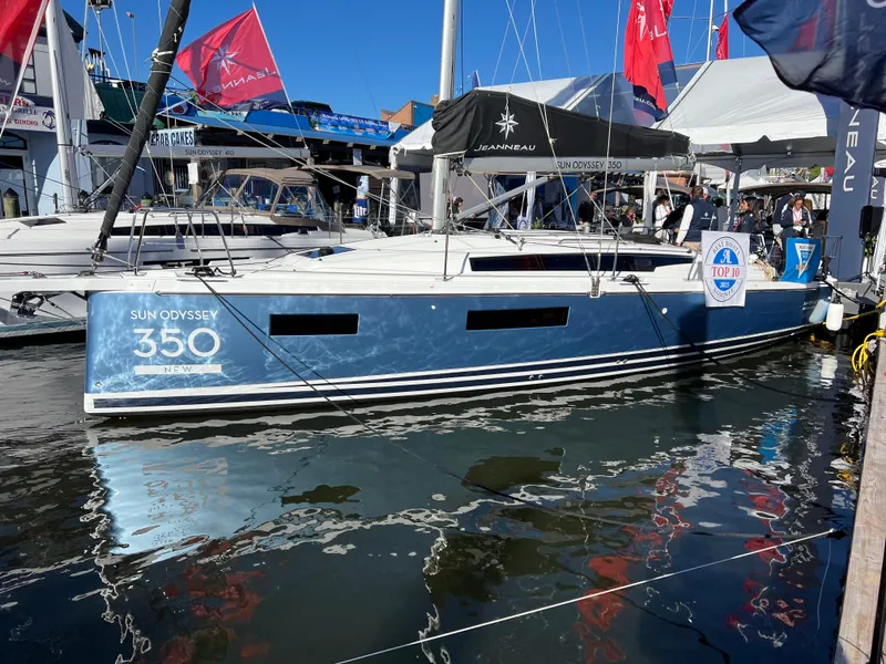 The Image of 2025 Jeanneau Sun Odyssey 350 sailboat at marina, showcasing sleek design and modern features. - 0