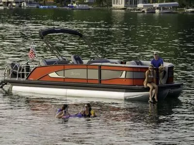 Slide: The Image of Luxurious seating in 2025 Barletta L25U pontoon boat with tan upholstery and diamond stitching. - 1