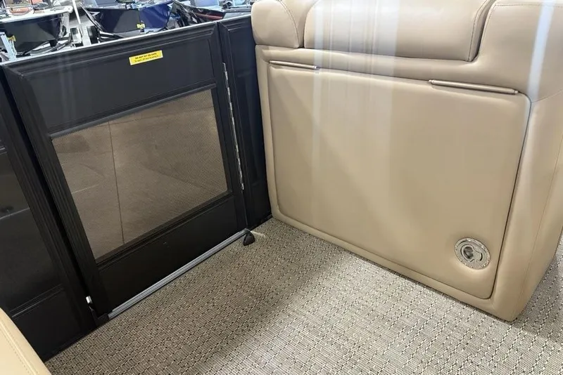 Slide: The Image of 2025 Barletta L25U interior with cup holders, speaker, and stylish handle. - 20