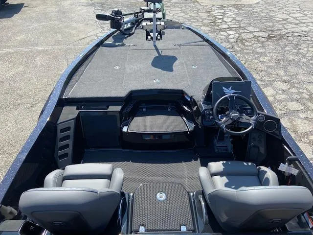 Slide: The Image of 2026 iKon VLX 20 boat interior with dual seats and steering console. - 3