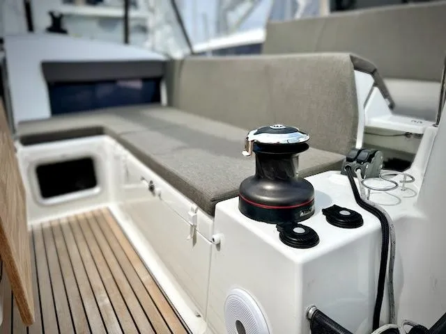 Slide: The Image of 2023 Jeanneau Sun Odyssey 440 yacht interior with seating and winch. - 22