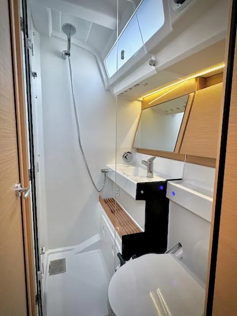 Slide: The Image of Modern bathroom in 2023 Jeanneau Sun Odyssey 440 yacht, featuring sleek design and efficient use of space. - 41
