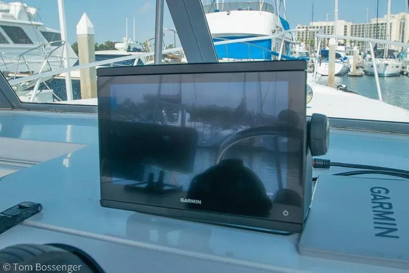 Slide: The Image of Garmin navigation system on 1999 Mainship Pilot 30 boat, docked at marina. - 26
