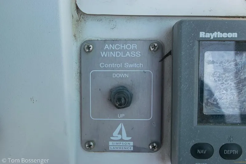 Slide: The Image of Anchor windlass control switch on 1999 Mainship Pilot 30 boat dashboard. - 28