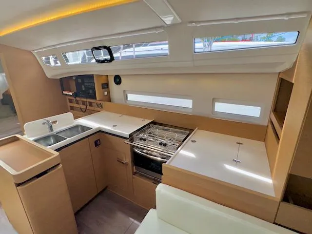 Slide: The Image of Modern kitchen interior of 2024 Jeanneau Sun Odyssey 410 yacht. - 23
