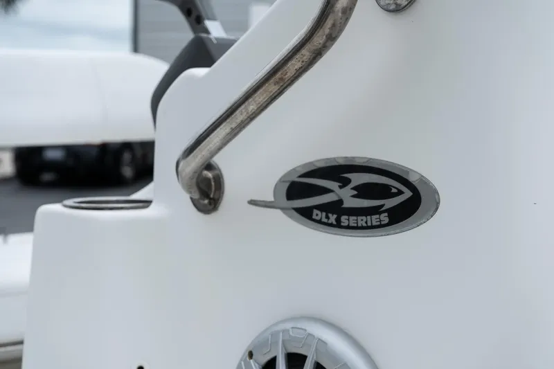 Slide: The Image of Close-up of 2015 Carolina Skiff 1980 DLX Series logo and handle. - 13