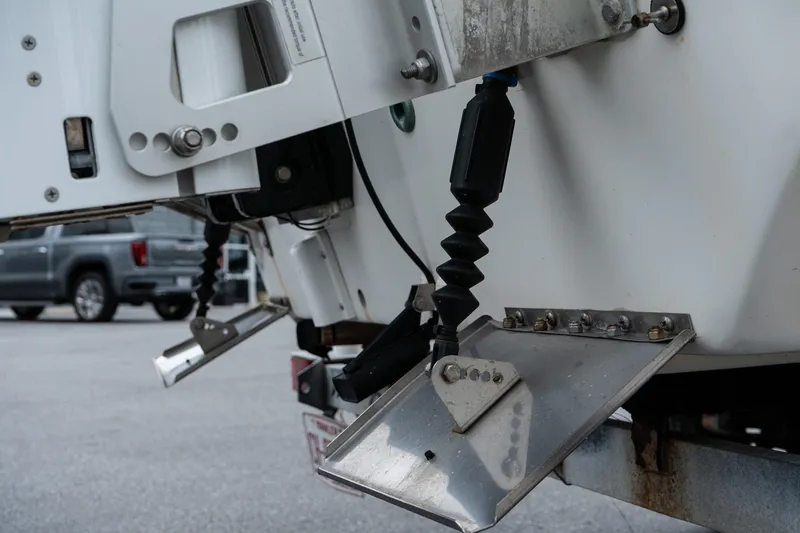 Slide: The Image of Close-up of 2015 Carolina Skiff 1980 DLX boat trim tab mechanism. - 7
