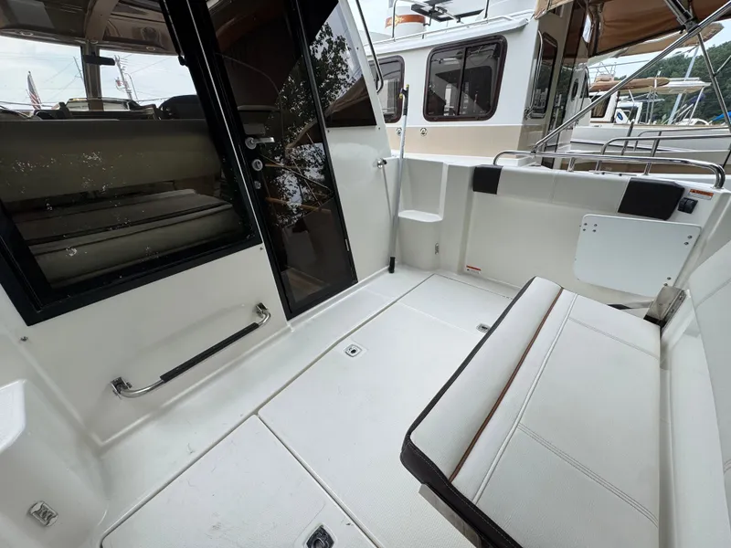Slide: The Image of 2016 Cutwater C-24 boat interior with seating and sleek design. - 12